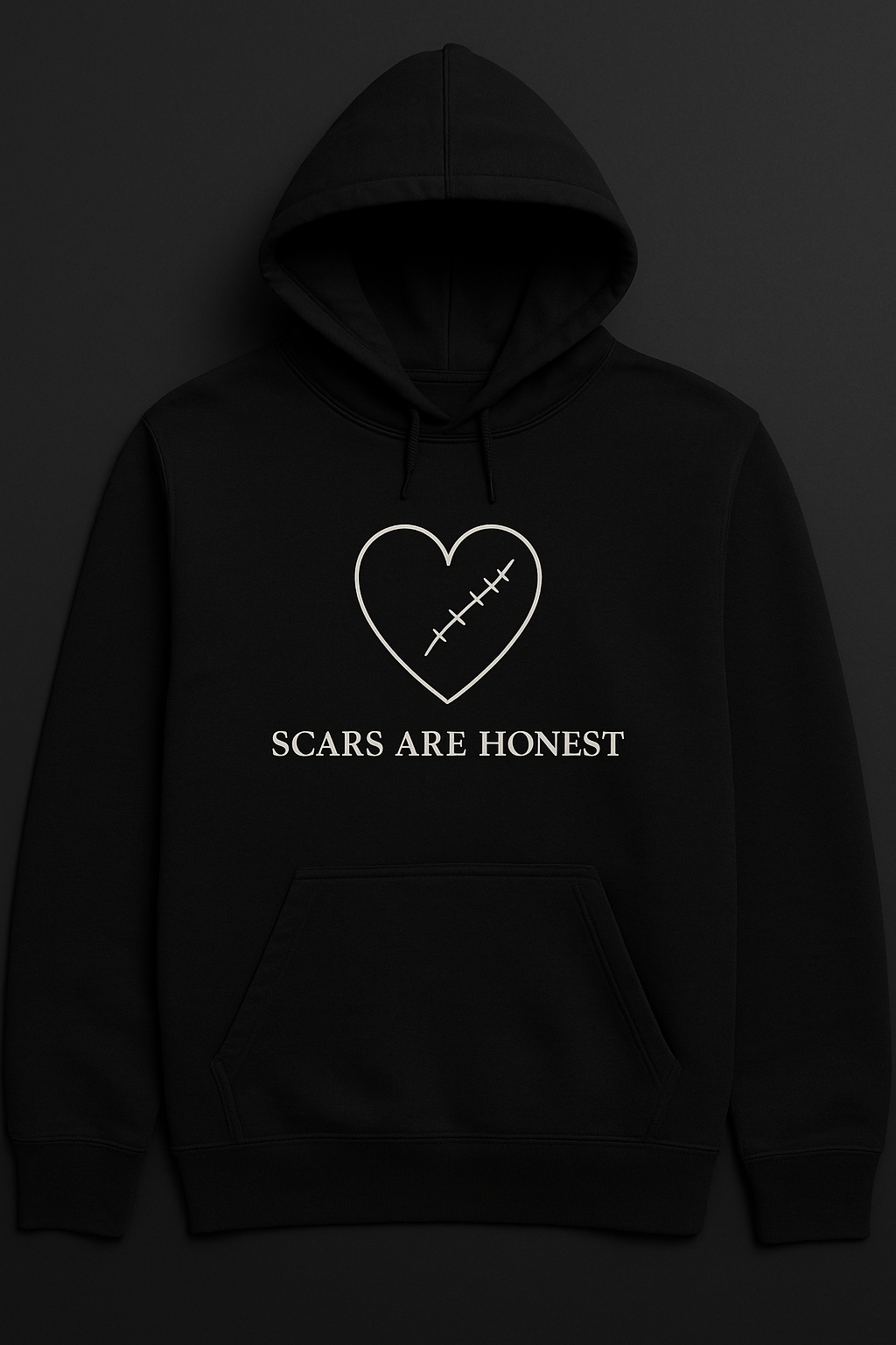 Black hoodie with a heart design and 'Scars are Honest' text on a dark background