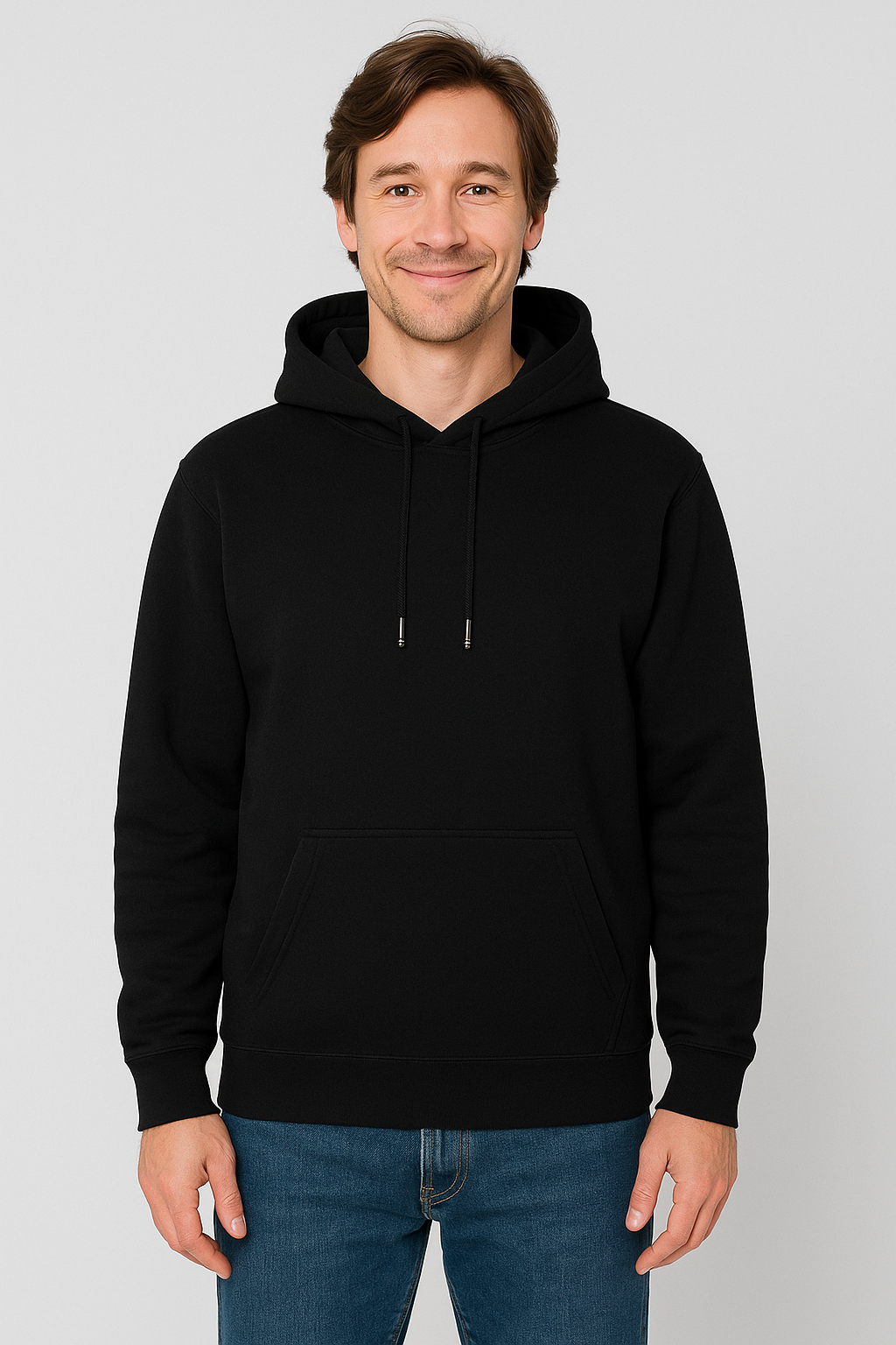 Person wearing a black hoodie on a plain background